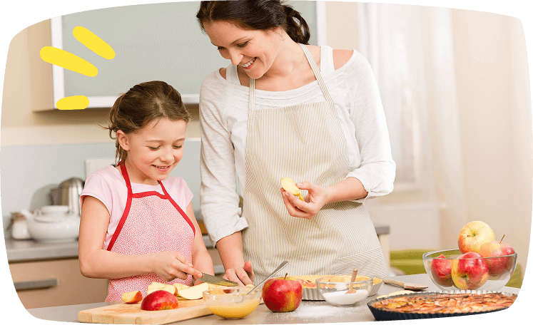 niña-con-su-madre-cocinando