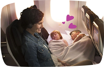 madre en avion con recien nacidos